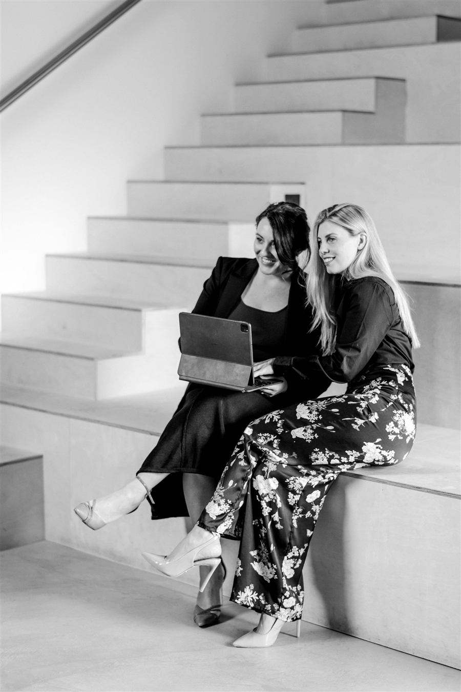 Elysian Law lawyers reviewing a client matter together